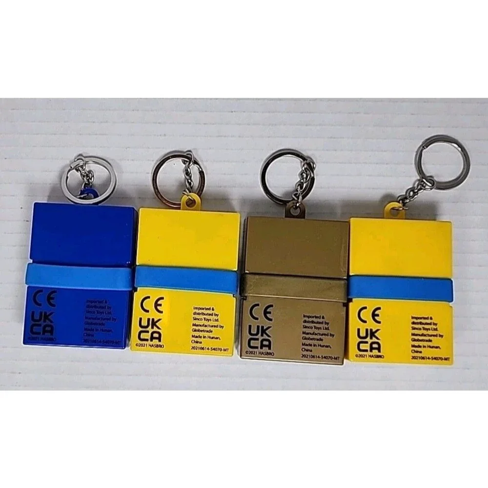 Hasbro 4 Mini Keychain Games Monopoly, Clue, Operation, Trivial Pursuit 2021
